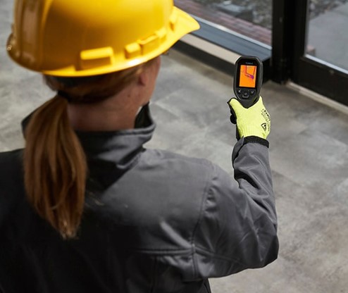 Credit FLIR - woman holding thermal imaging camera